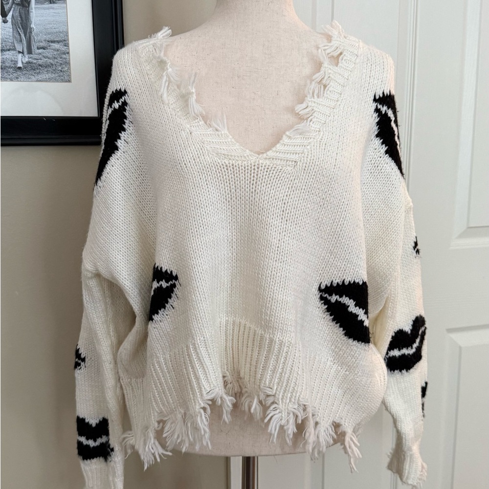 Miracle V-Neck White and Black Sweater with Distressed Details